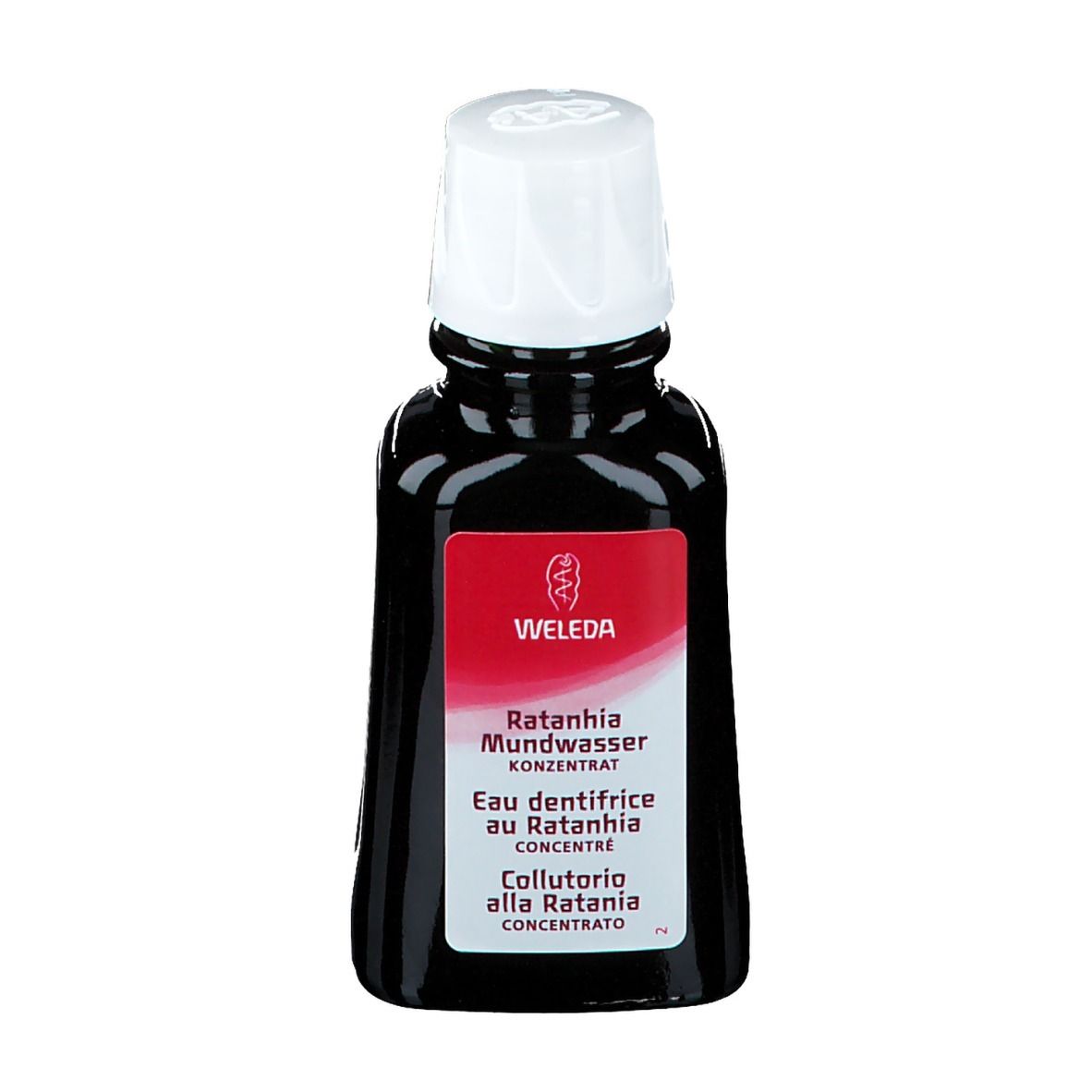 WELEDA Mundwasser Ratania. Flasche mit weißem Verschluss. Rotes Etikett mit Produktnamen. Schwarze Flüssigkeit.
