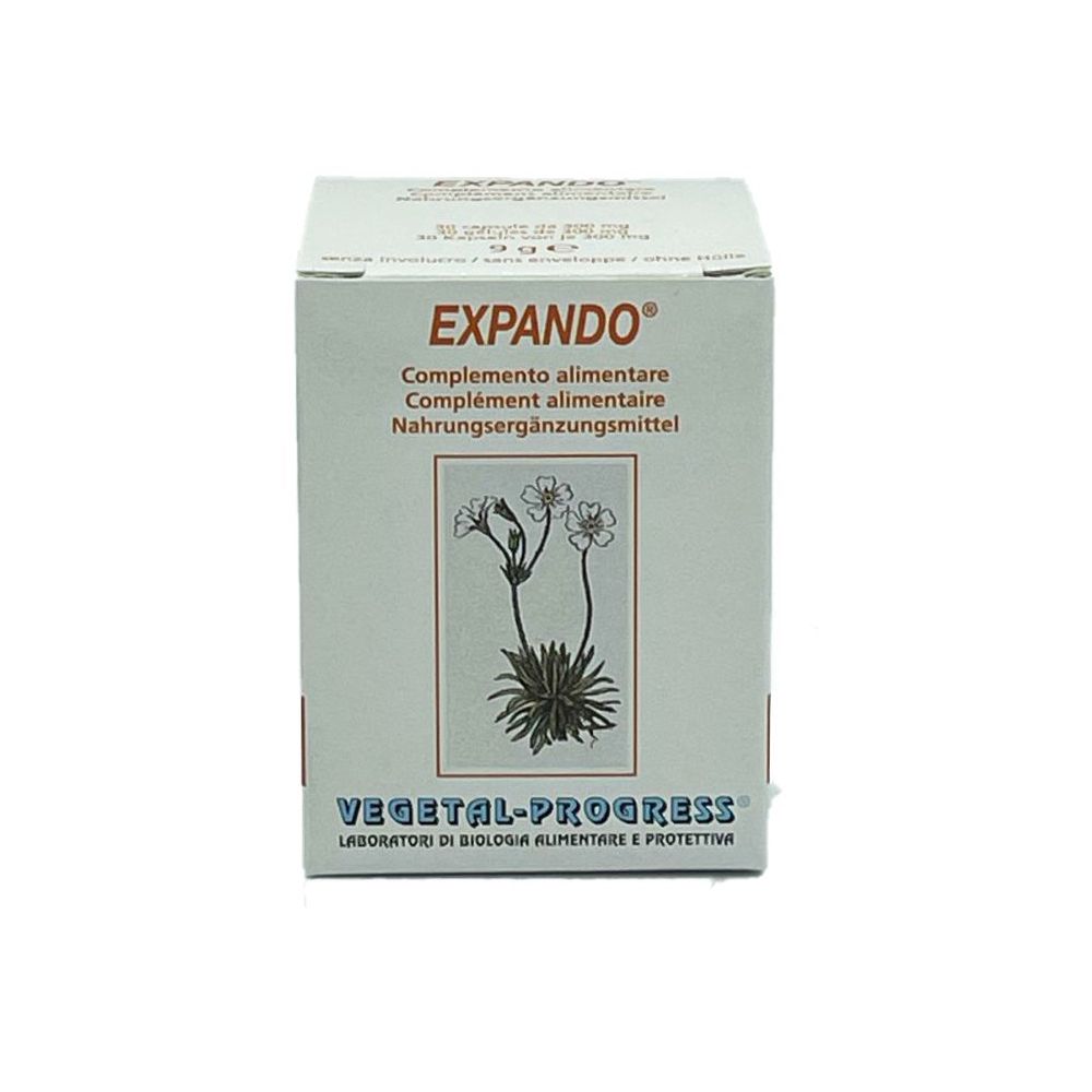 Boîte blanche avec EXPANDO, motif floral et texte multilingue. Marque: Vegetal-Progress. Complément alimentaire.