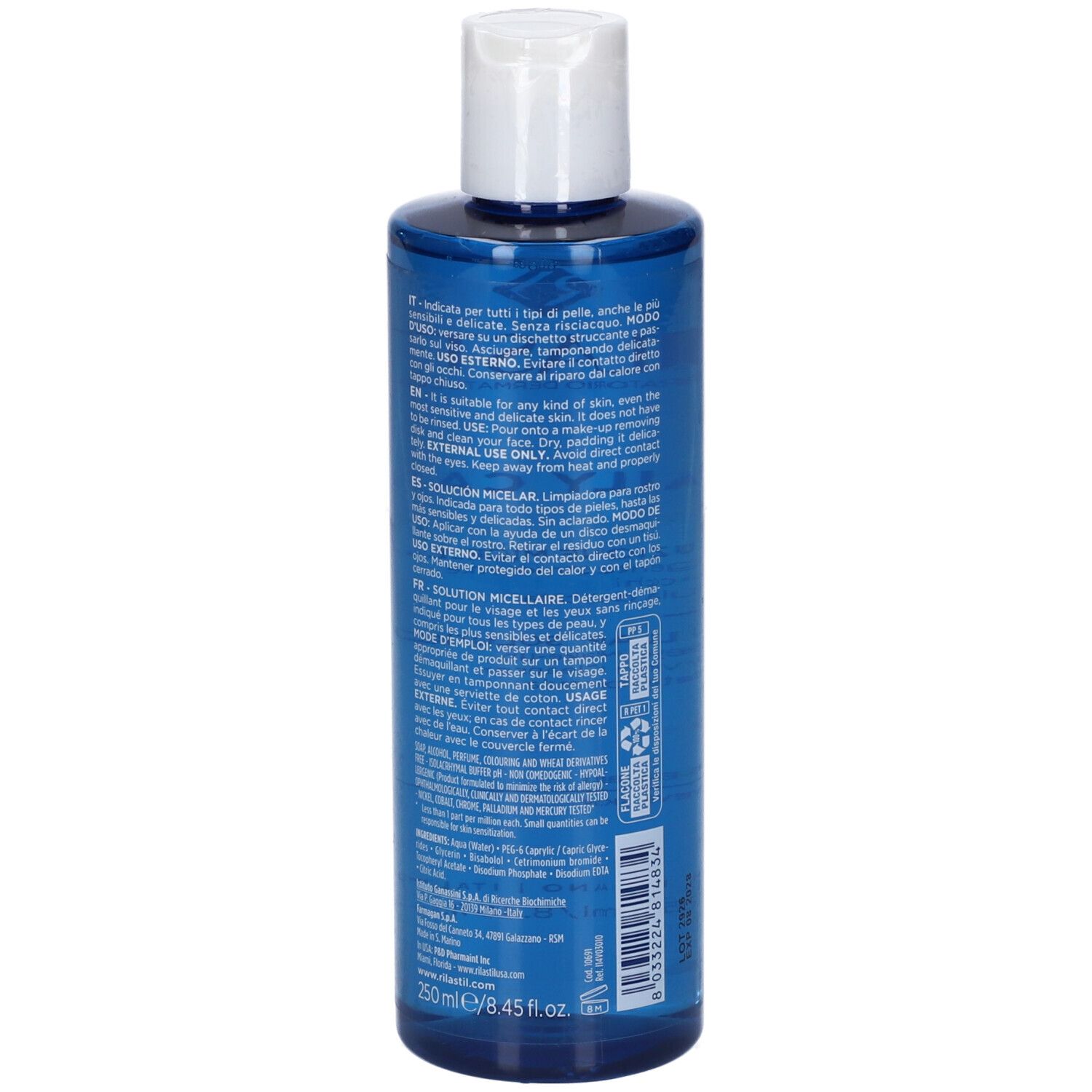 Rückseite der blauen Flasche mit weißem Deckel. Text in mehreren Sprachen. Inhaltsstoffe und Anwendungshinweise.