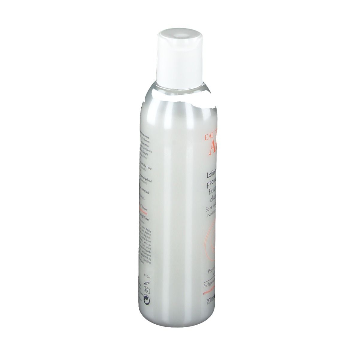 Silberne Flasche mit weißem Deckel. Text auf der Seite. Produkt für empfindliche Haut.