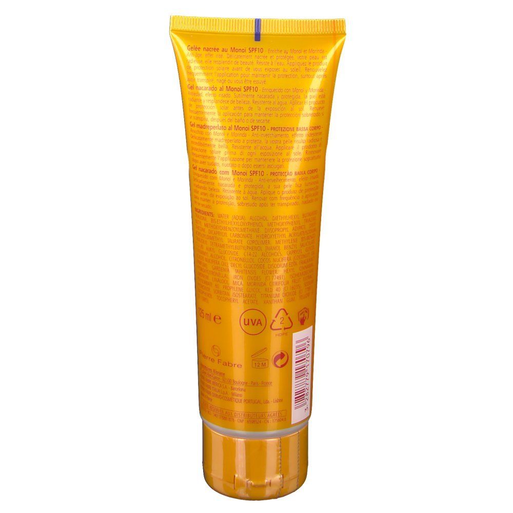 Dos du tube de gel. Jaune avec texte. Inscription : Gelée nacrée au Monoï SPF 10. Avec symbole UVA et symboles de recyclage.