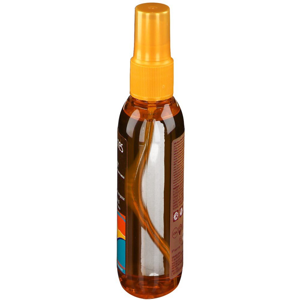 Flacon spray brun, vue latérale. Bouchon jaune. Étiquette avec texte. Bande colorée. Liquide transparent visible.