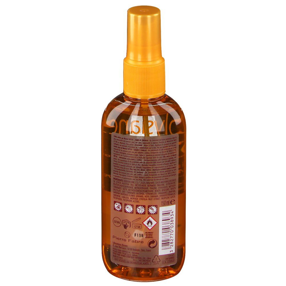 Flacon spray brun, vue arrière. Bouchon jaune. Étiquette avec texte et symboles. Liquide transparent visible.