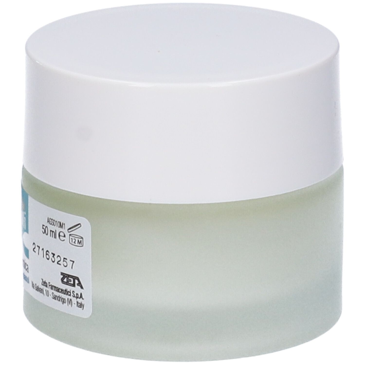 Pot de crème avec couvercle blanc. Étiquette avec texte. 50 ml. Informations du fabricant.