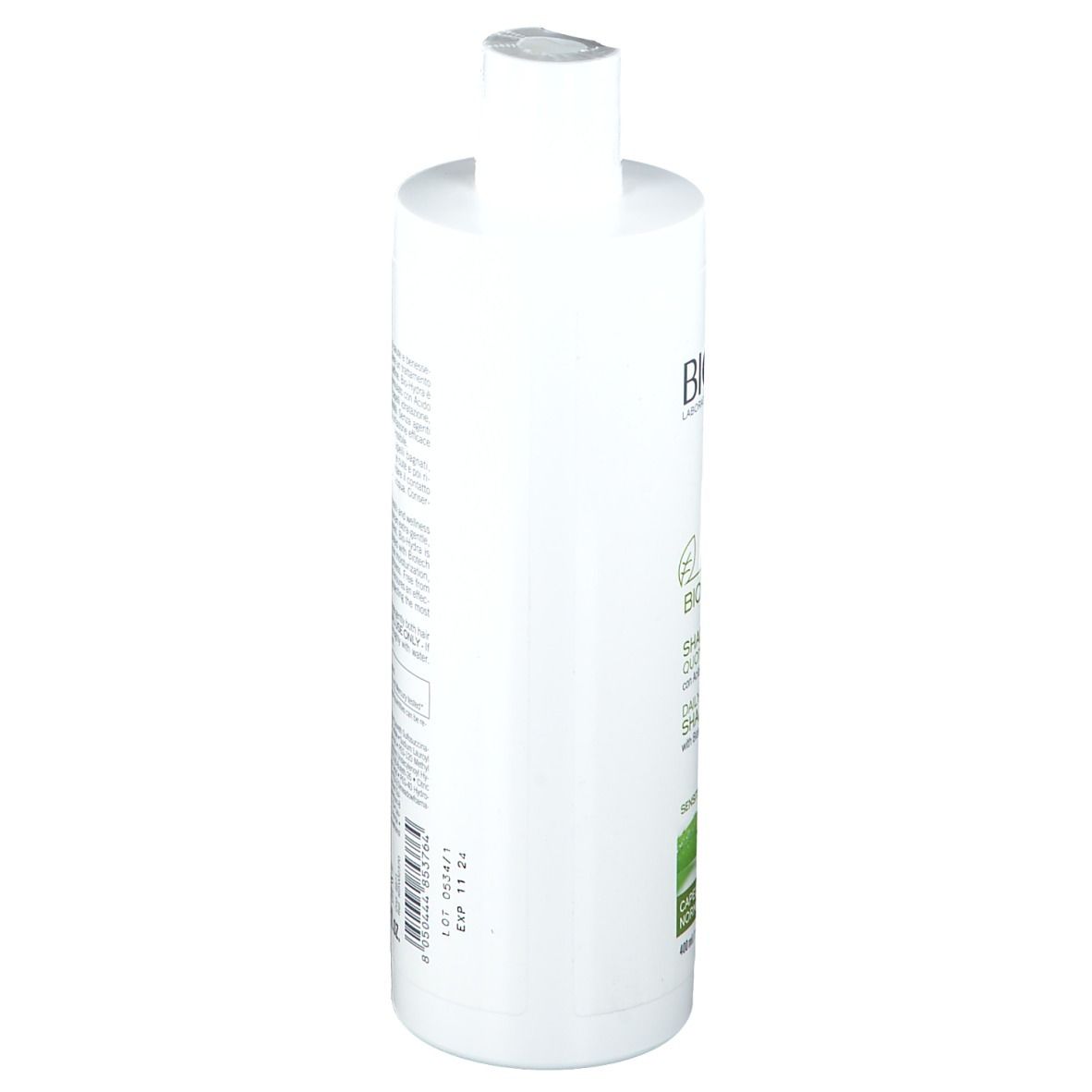 Weiße Shampoo-Flasche, Seitenansicht. Enthält Text in italienischer und englischer Sprache. Mit Produktionsdatum.