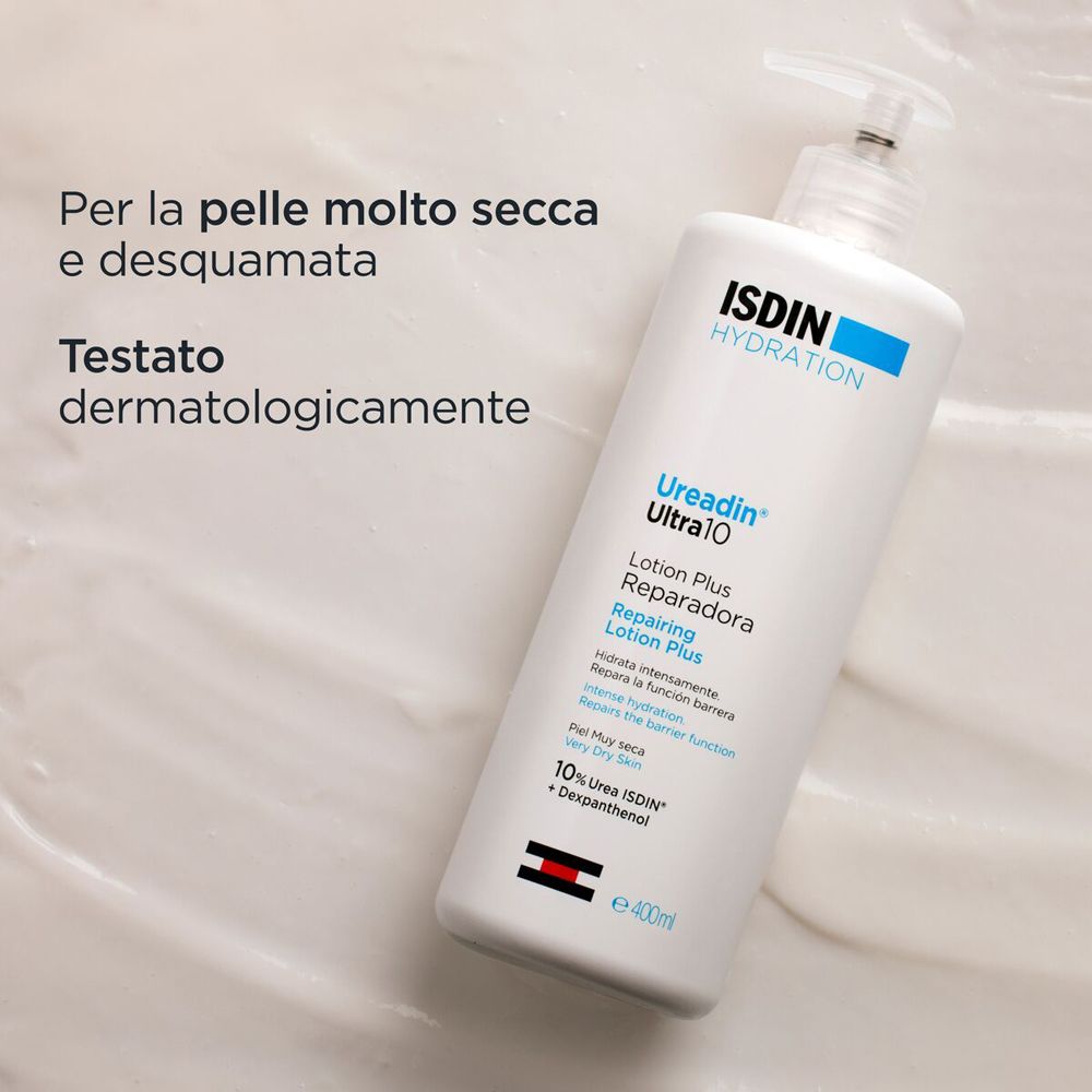 Flacon de lotion sur surface blanche. Texte : Pour peau très sèche, testé dermatologiquement.