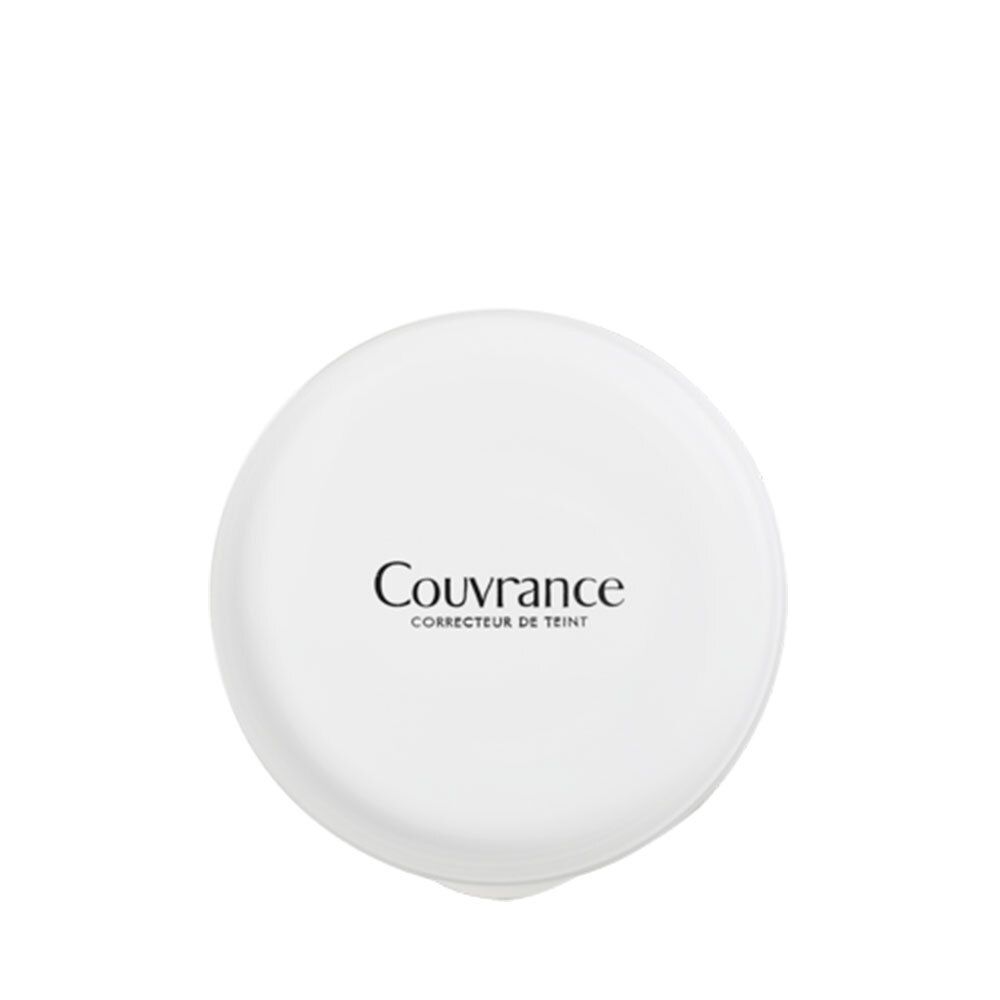 Couvercle de poudre compacte blanc avec inscription noire 'Couvrance' et 'Correcteur de Teint'.