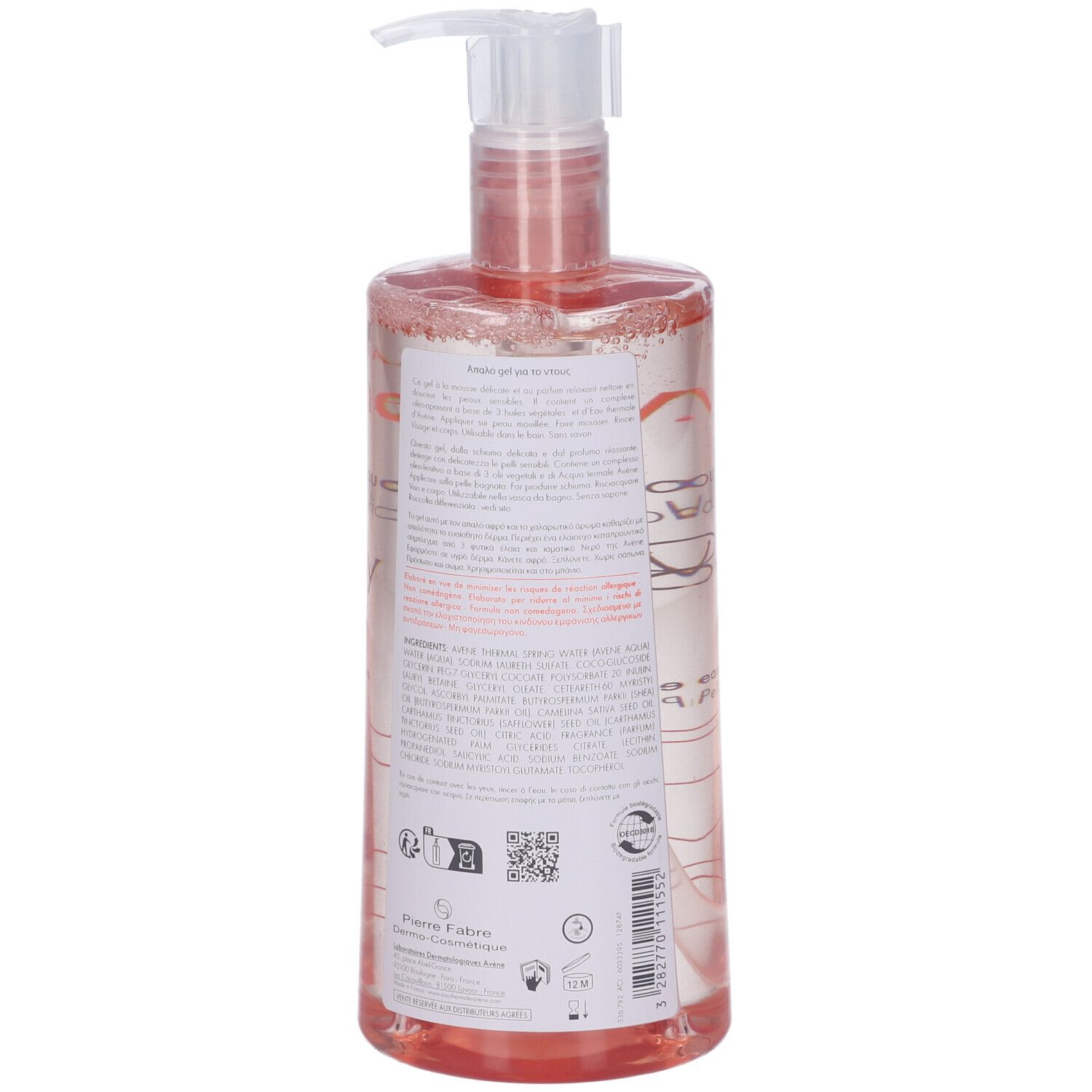 Flacon transparent avec liquide rose. Dos avec texte et illustrations. Avec pompe doseuse.