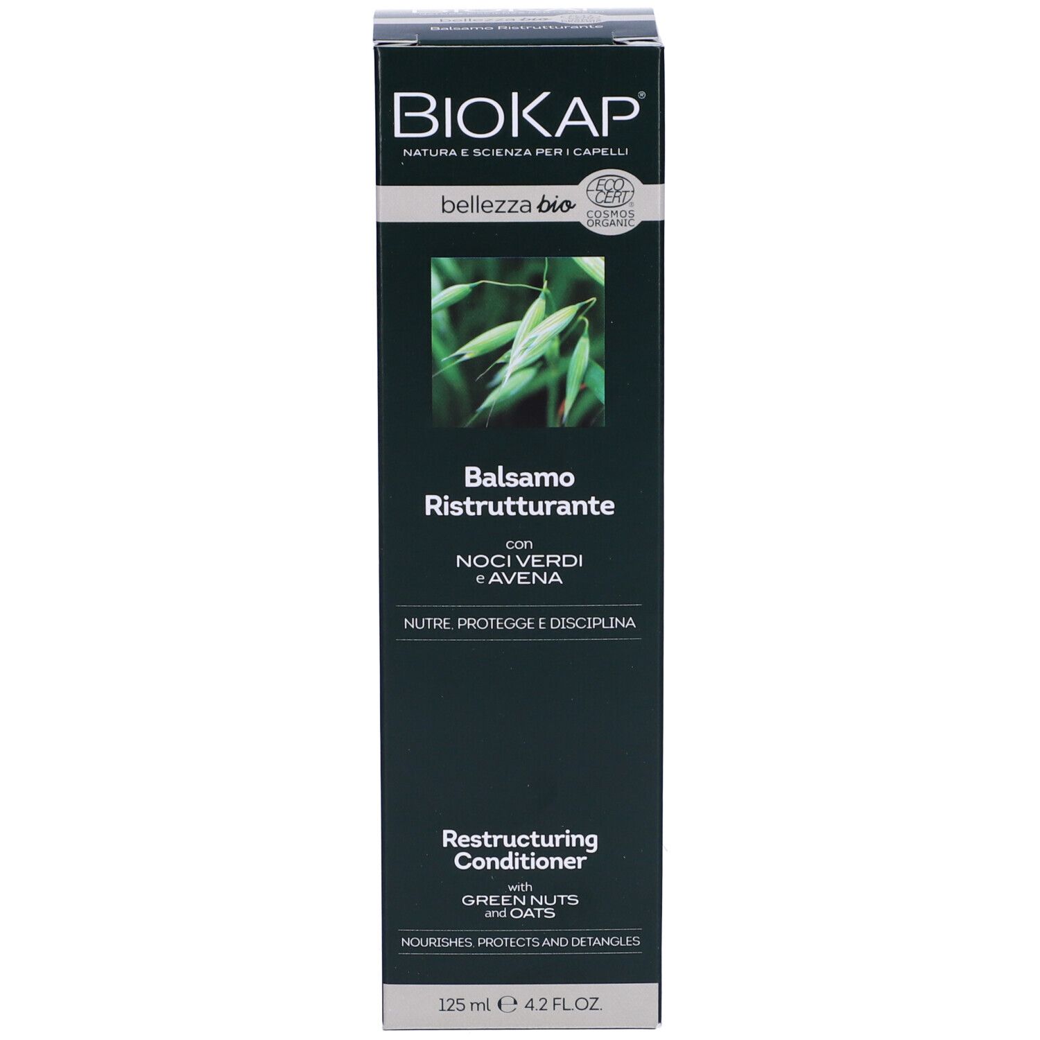 Schwarzer Karton mit "BIOKAP"-Logo und Produktnamen. Enthält Balsamo Ristrutturante mit Noci Verdi e Avena. 125 ml.