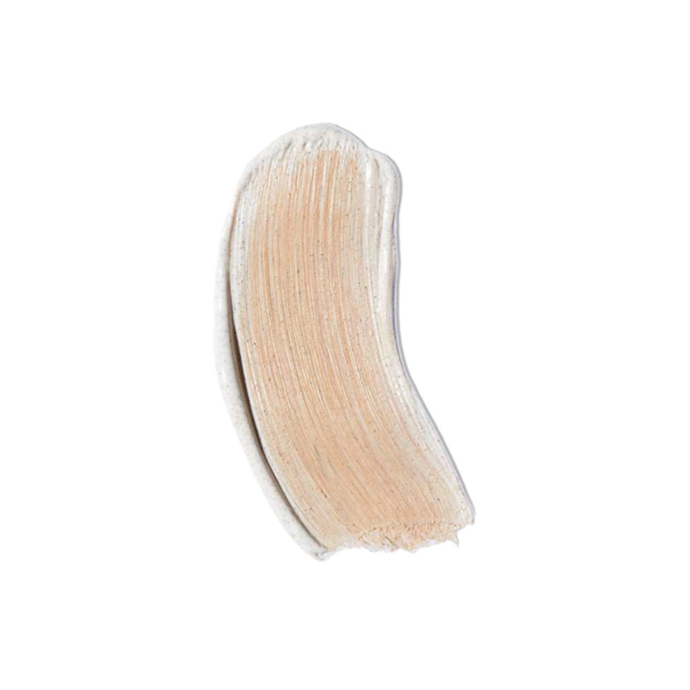 Heller Farbklecks. Creme mit leicht körniger Textur. Auf hellem Hintergrund.