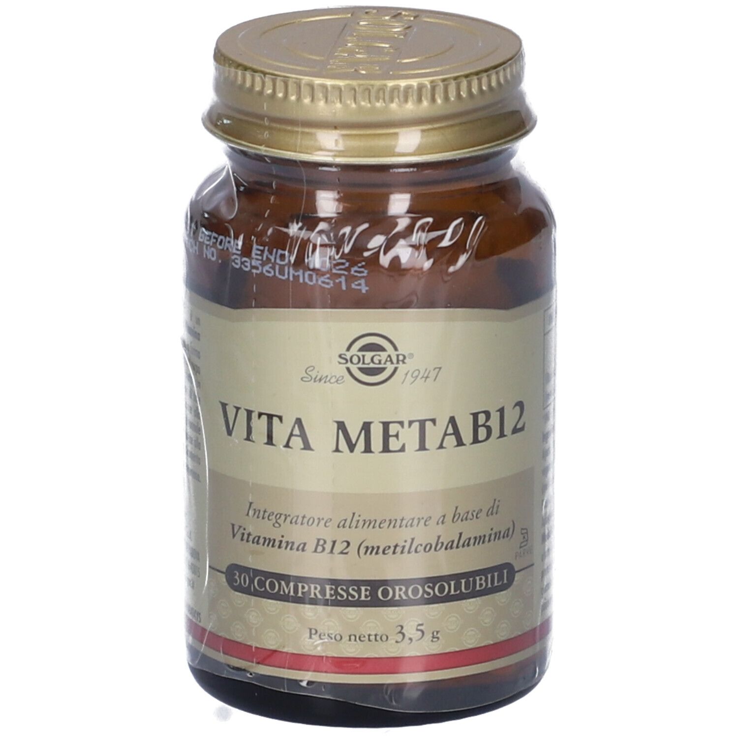 Flacon en verre brun, couvercle doré, emballé. Étiquette "SOLGAR Vita MetaB12".