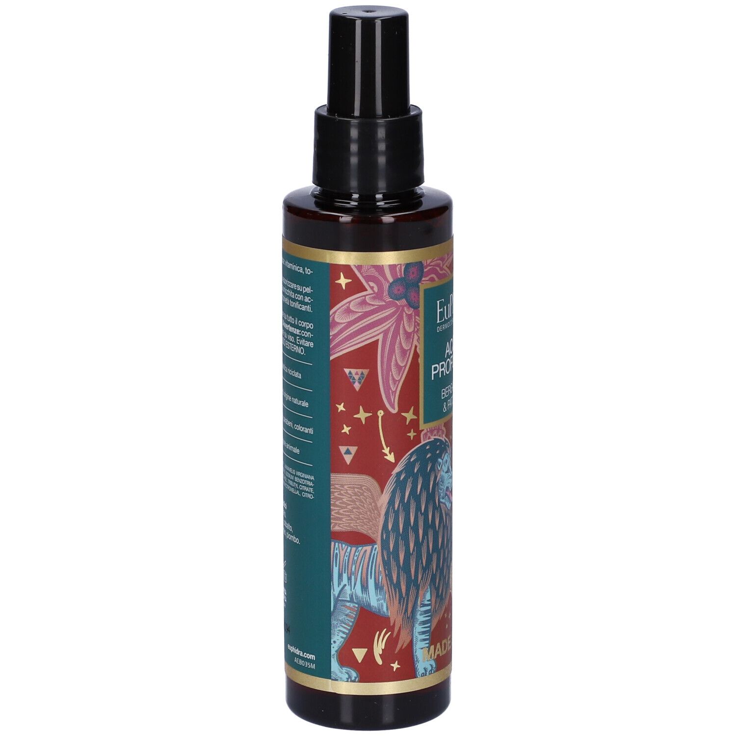 Flacon marron avec vaporisateur noir. Étiquette avec texte et illustrations. Fabriqué en Italie.