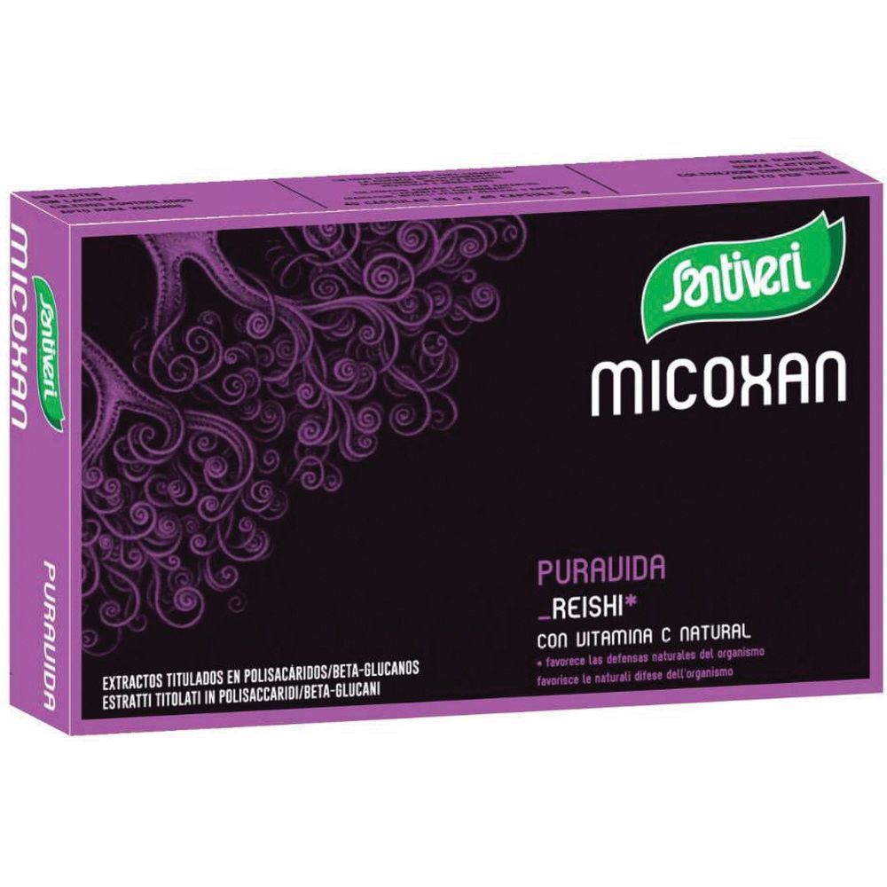 Lila Schachtel mit Santiveri Micoxan Puravida. Schwarzer Hintergrund mit weißen Schriftzügen und lila Muster. Grün-weißes Logo.