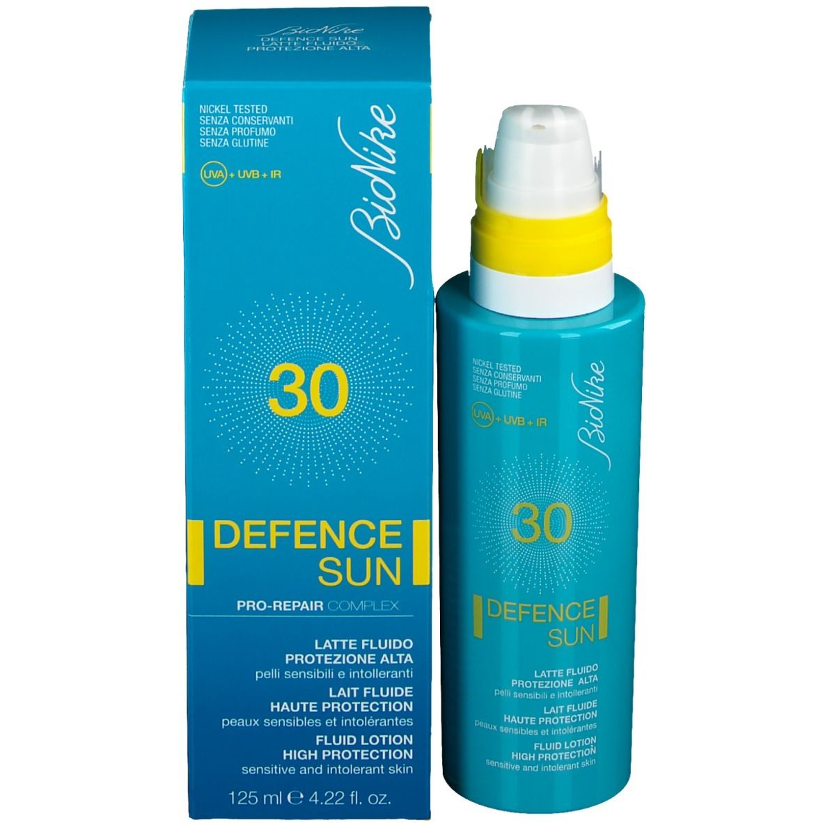 Türkisblaue Flasche und Schachtel. Aufschrift: 30, Defence Sun, Pro-Repair Complex, Lait Fluide, High Protection. 125 ml.
