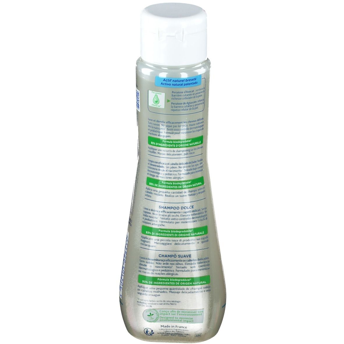 Dos du flacon de shampooing Mustela Dolce. Texte et logos sur étiquette bleue et verte. Fabriqué en France.