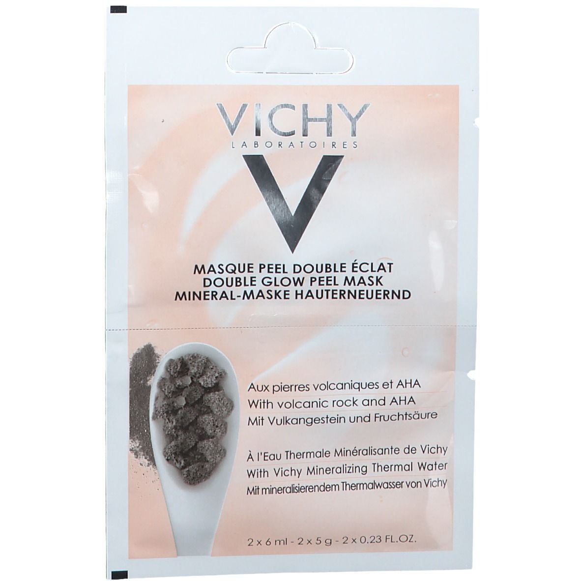 Vichy Peelingmaske. Einzelverpackung. Produktname und Logo sichtbar. Text: "Masque Peel Double Éclat". Abbildung von Inhaltsstoffen.