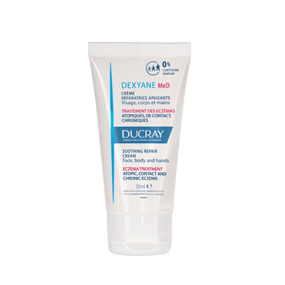 Creme-Tube. Weiß, mit blauer Schrift. Enthält 0% Cortison. Marke: Ducray. Für Gesicht, Körper und Hände.