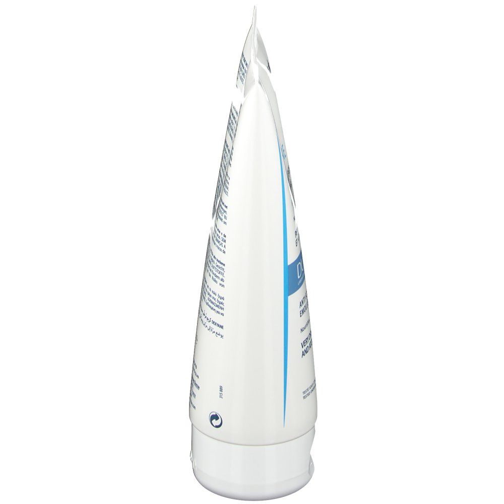 Vue latérale d'un tube blanc. Contient du texte. Impressions et symboles. Le bouchon et le tube sont blancs.