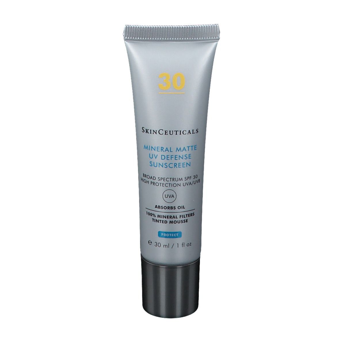 Tube argentée de crème solaire. Inscription: SkinCeuticals Mineral Matte UV Defense Sunscreen SPF 30. 30 ml.