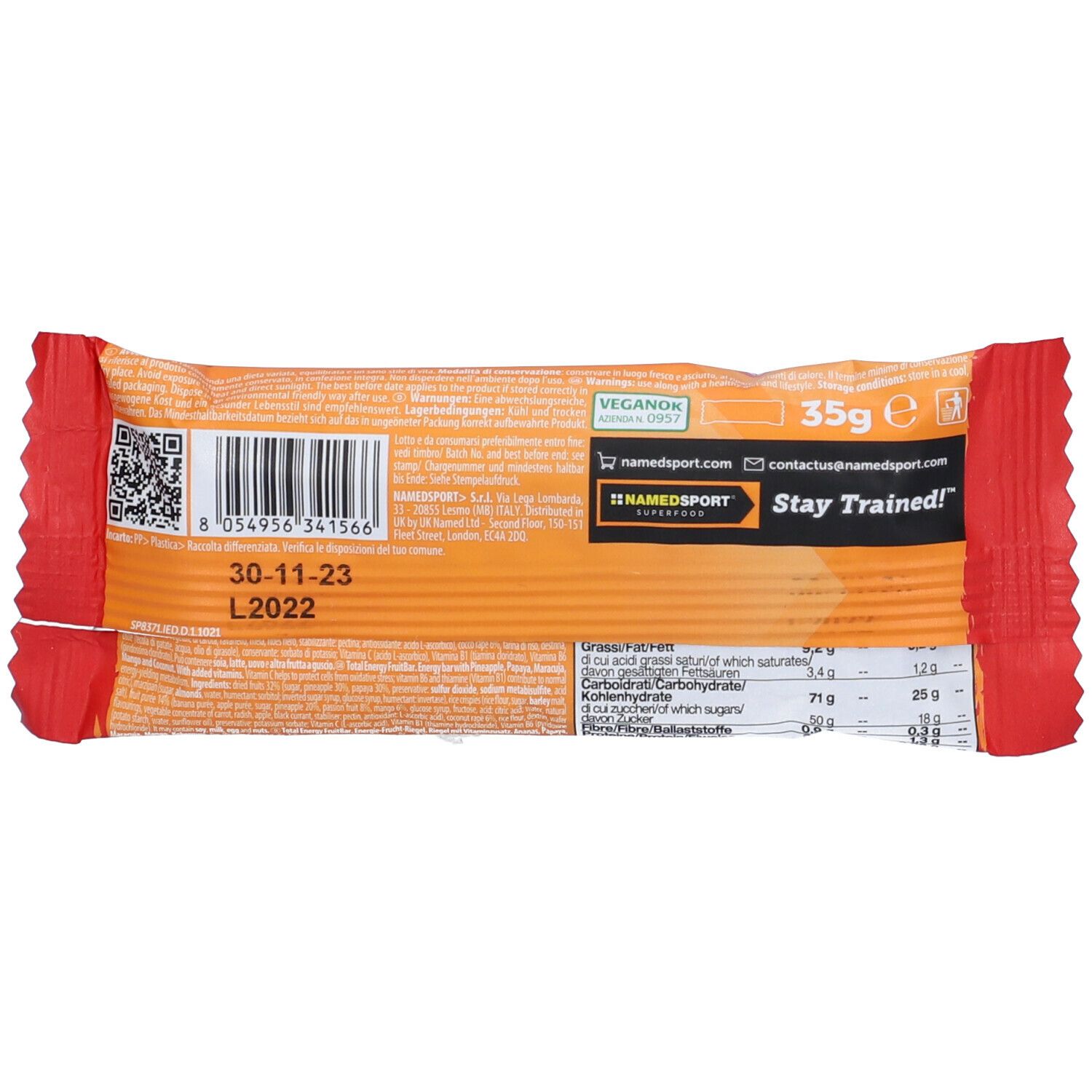 Rückseite des Energieriegels. Orangefarbene Verpackung mit Nährwertangaben und Barcode.