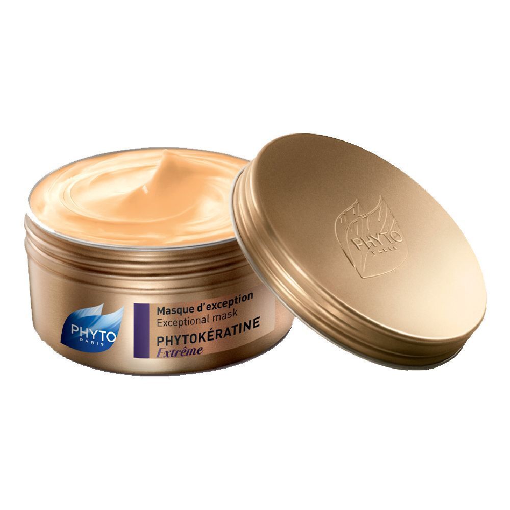 Pot doré de masque capillaire ouvert. Inscription: PHYTOKÉRATINE Extrême. Marque: PHYTO PARIS.
