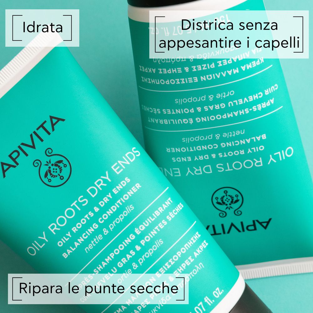 Zwei Tuben. Aufschrift: APIVITA, OILY ROOTS DRY ENDS, Balancing Conditioner. Text: Idratata, Districa senza appesantire i capelli, Ripara le punte secche.