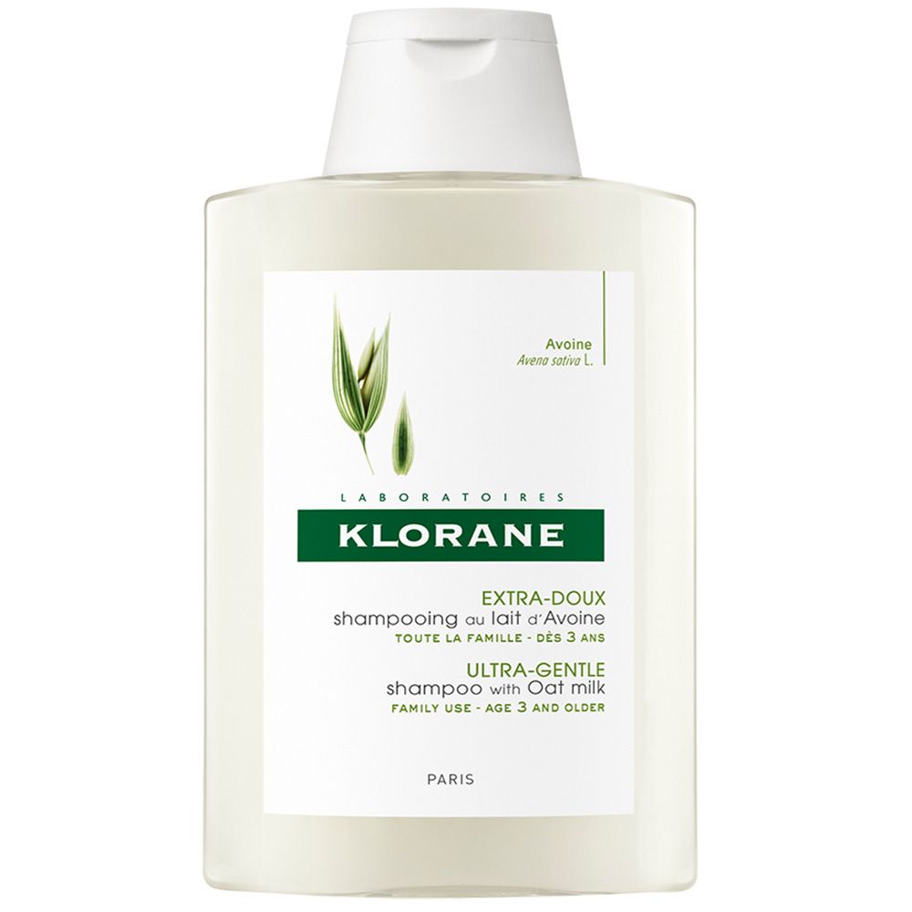 Klorane Shampoo-Flasche mit Hafermilch. Weißes Fläschchen mit grünem Etikett. Text: Extra-Mild, Ultra-Gentle.