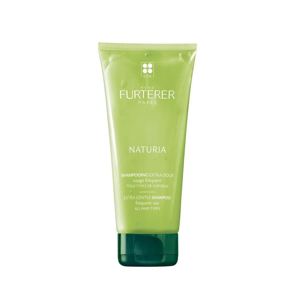 Tube verte de shampooing. Inscription: FURTERER PARIS, NATURIA, Shampooing extra-doux. Pour tous types de cheveux.