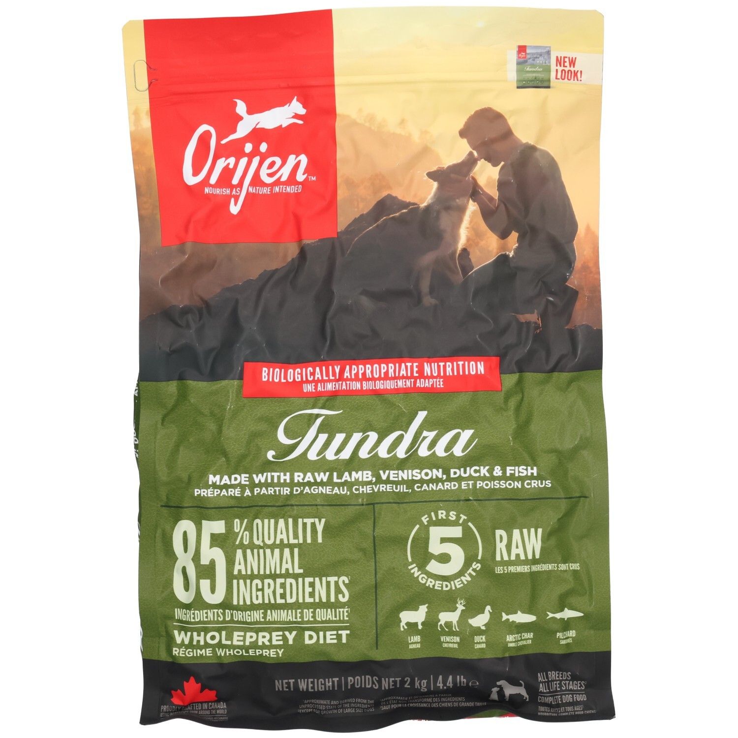 Orijen Tundra Hundefutter, 2kg Beutel mit Bild eines Mannes und Hunds.