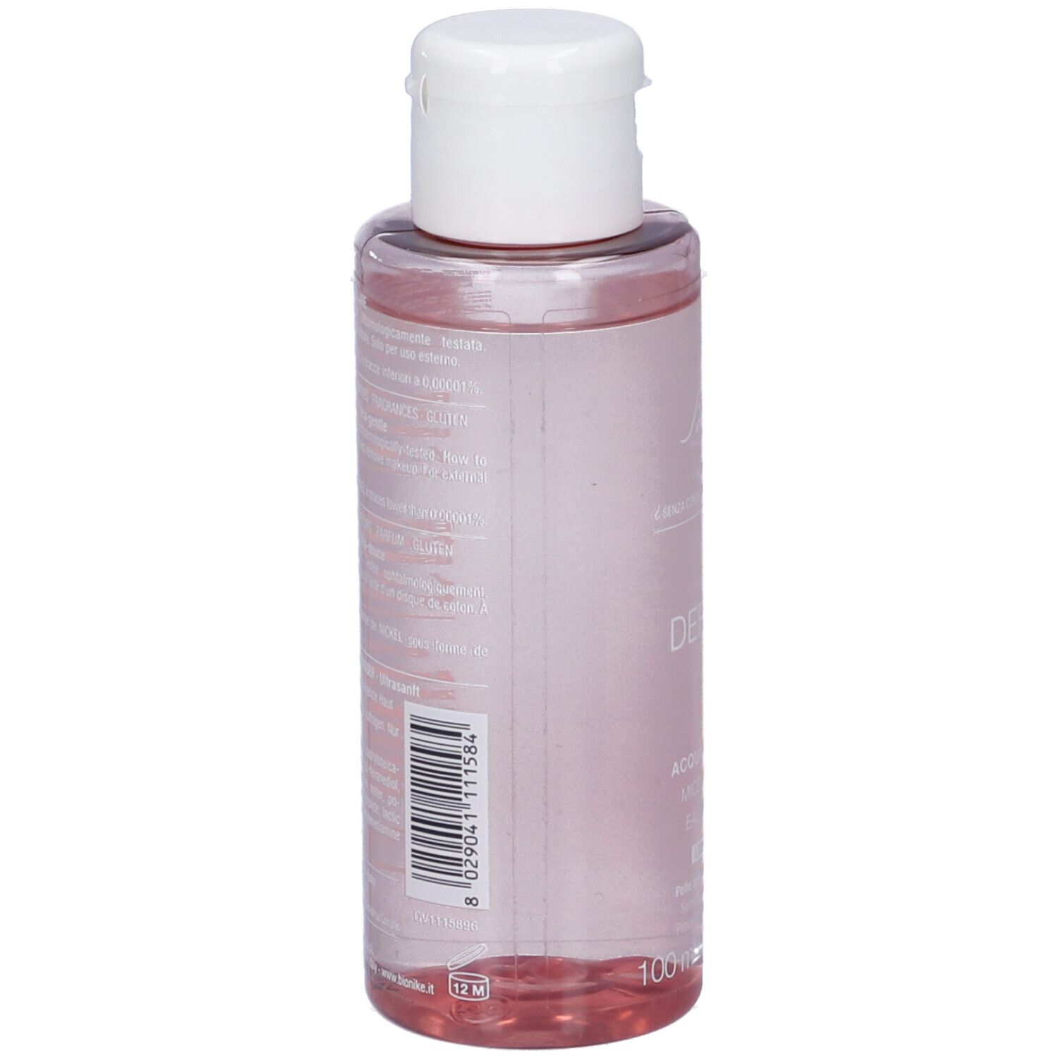 Dos du flacon. Code-barres et texte. Flacon avec liquide rose. Bouchon blanc.