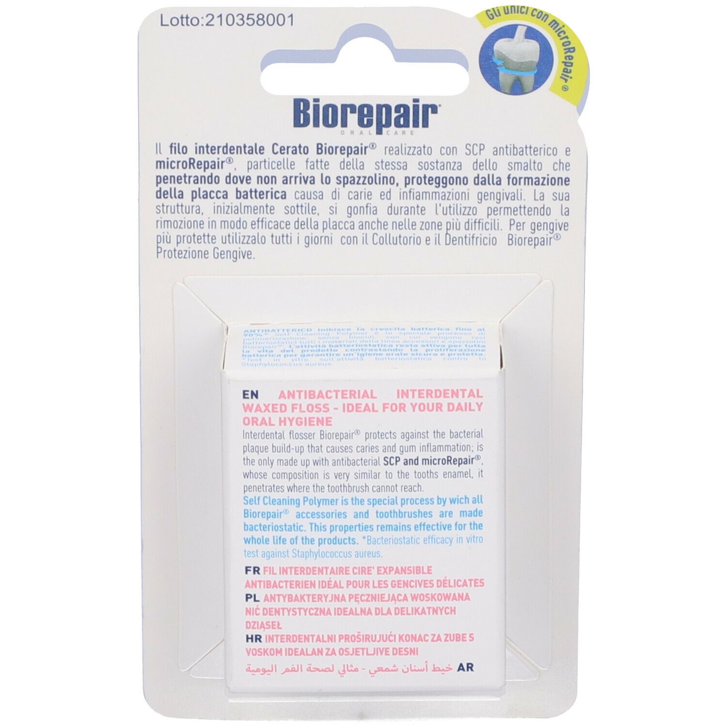 Rückseite der Zahnseide-Verpackung. Weißer Karton mit Text in verschiedenen Sprachen.