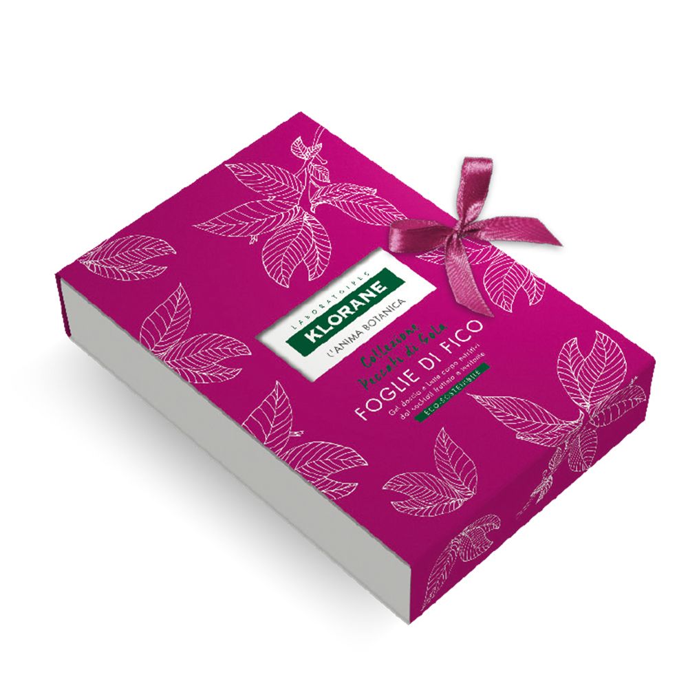 Klorane Feigenblatt Set. Rechteckige Geschenkbox, pink mit weißen Blättern. Schleife.