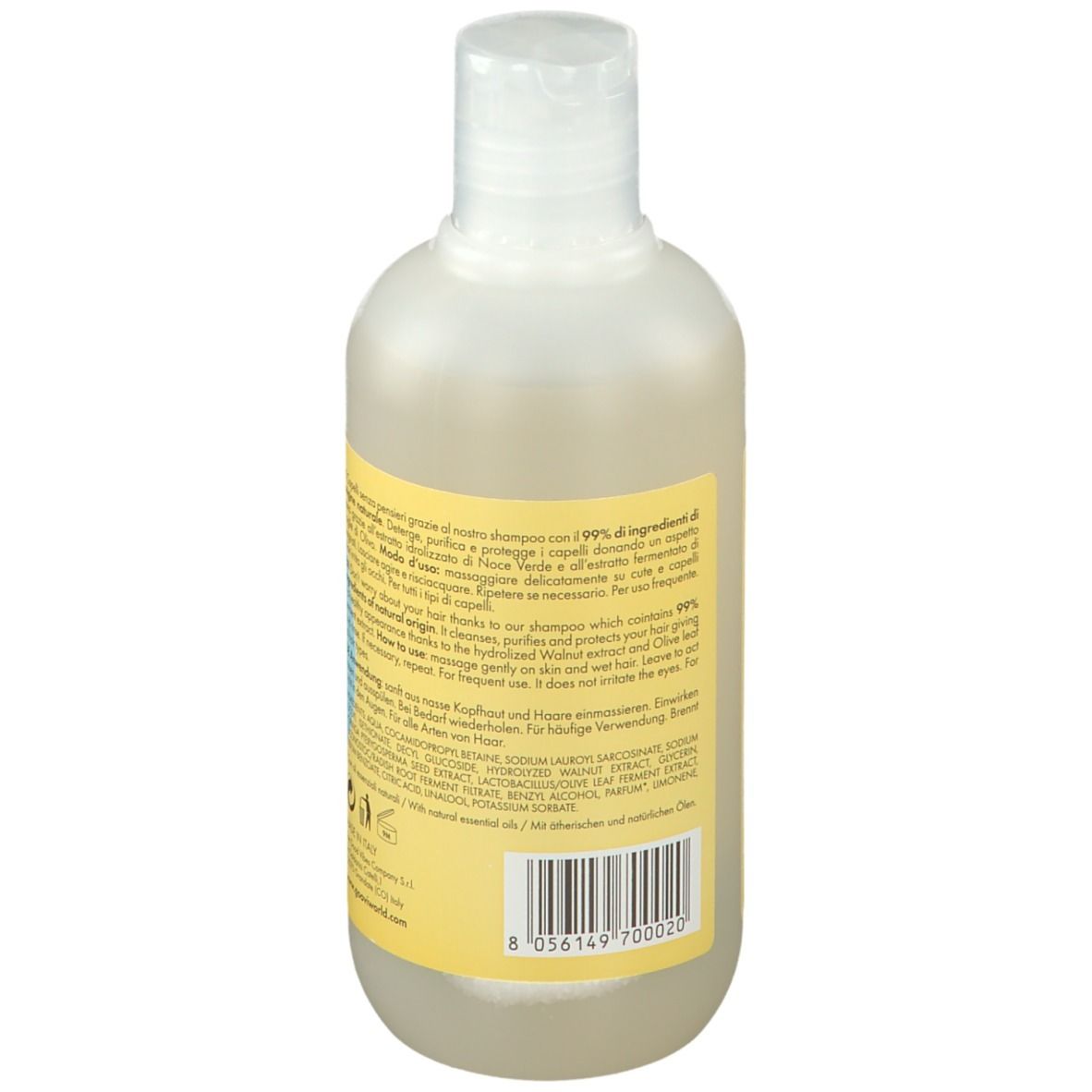 Rückseite der Goovi Shampoo-Flasche. Gelbes Etikett mit Text und Inhaltsangaben. Transparente Flüssigkeit sichtbar.