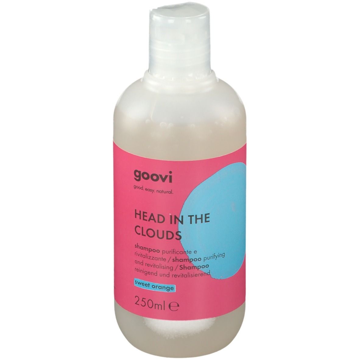 Goovi Shampoo Head In The Clouds. Bouteille avec étiquette rose, cercle bleu et texte. Contient 250ml. Orange douce.