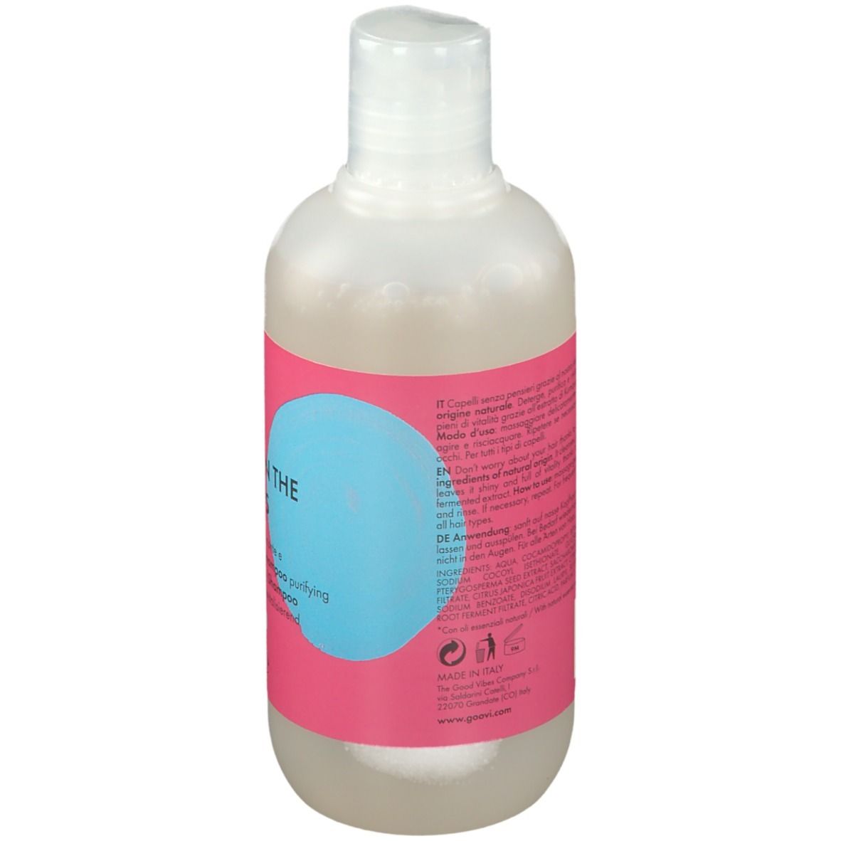Dos de la bouteille de shampooing Goovi. Étiquette rose avec texte en plusieurs langues. Contient des informations sur le produit.