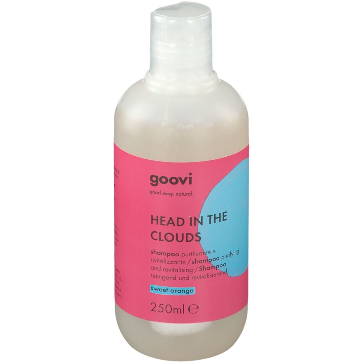 Goovi Shampoo Head In The Clouds. Bouteille avec étiquette rose, cercle bleu et texte. Contient 250ml. Orange douce.