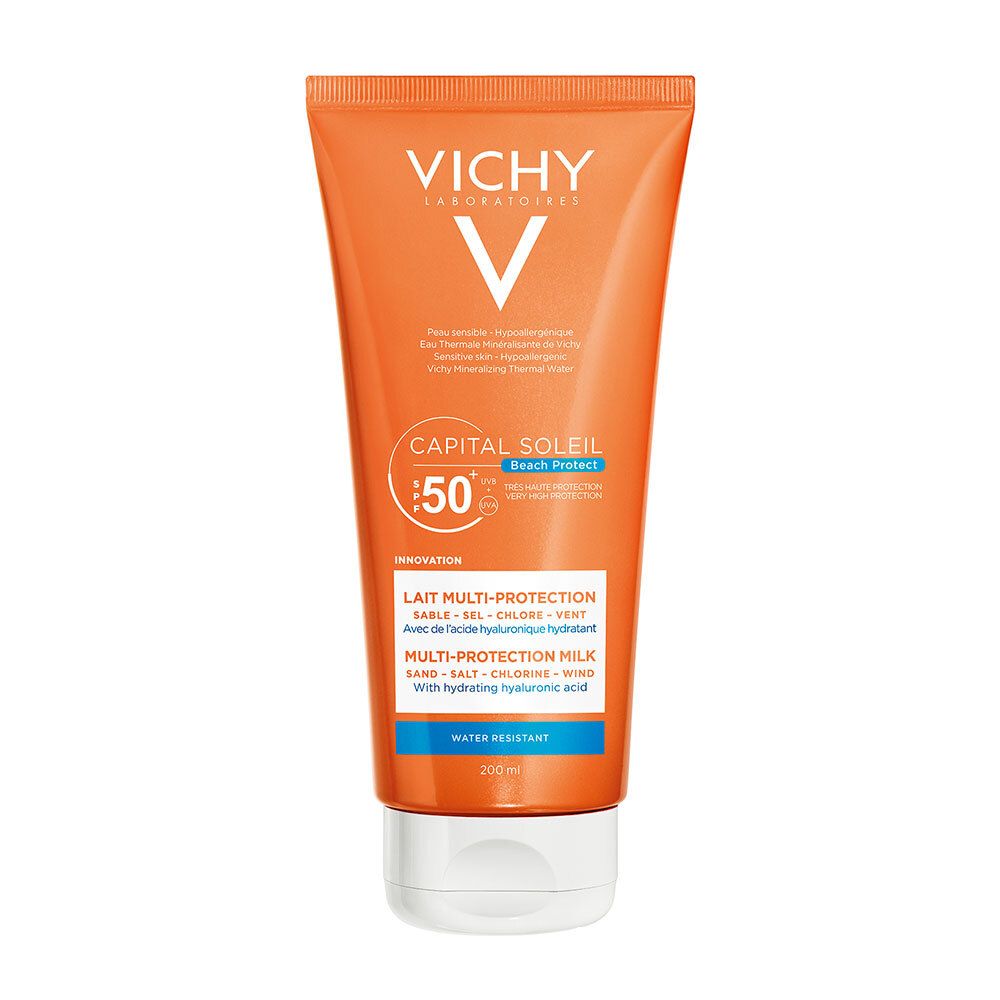 Tube orange avec bouchon blanc. Inscriptions: VICHY, CAPITAL SOLEIL, SPF 50+. Nom du produit et ingrédients visibles.