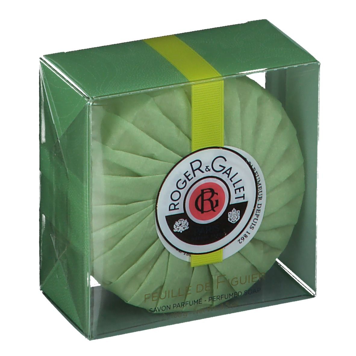 Savon rond emballé en vert. Logo et texte sur le savon. Boîte plastique transparente.