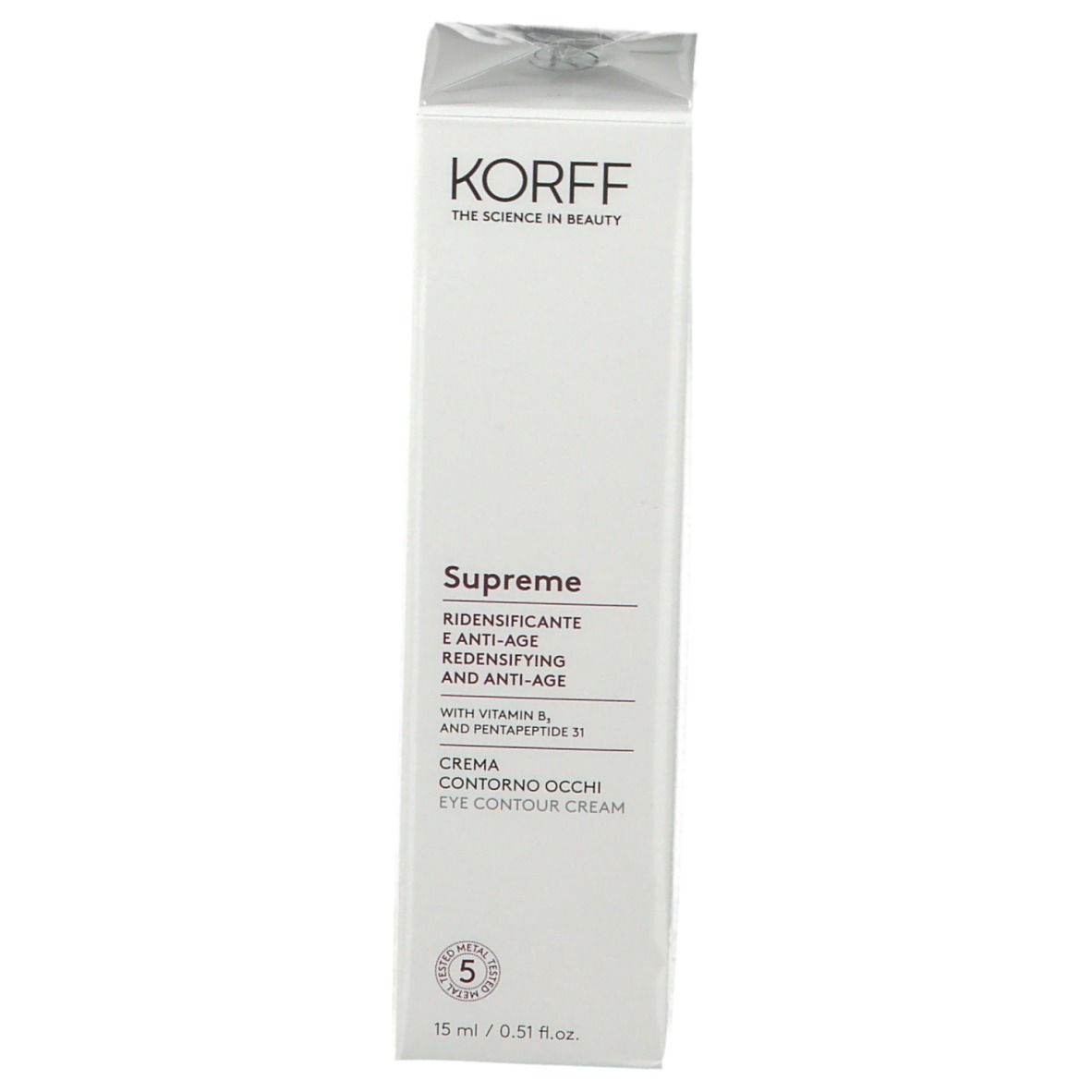 Emballage de la crème pour les yeux KORFF Supreme. Texte, sceau. Vue en angle.