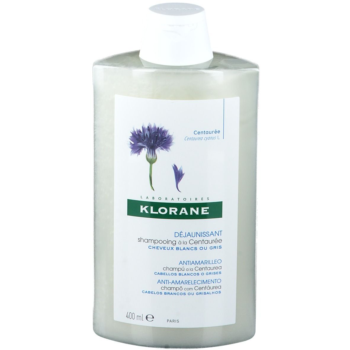 Flacon de shampooing KLORANE Anti-Gelbstich. Étiquette blanche avec fleur de bleuet et nom du produit.