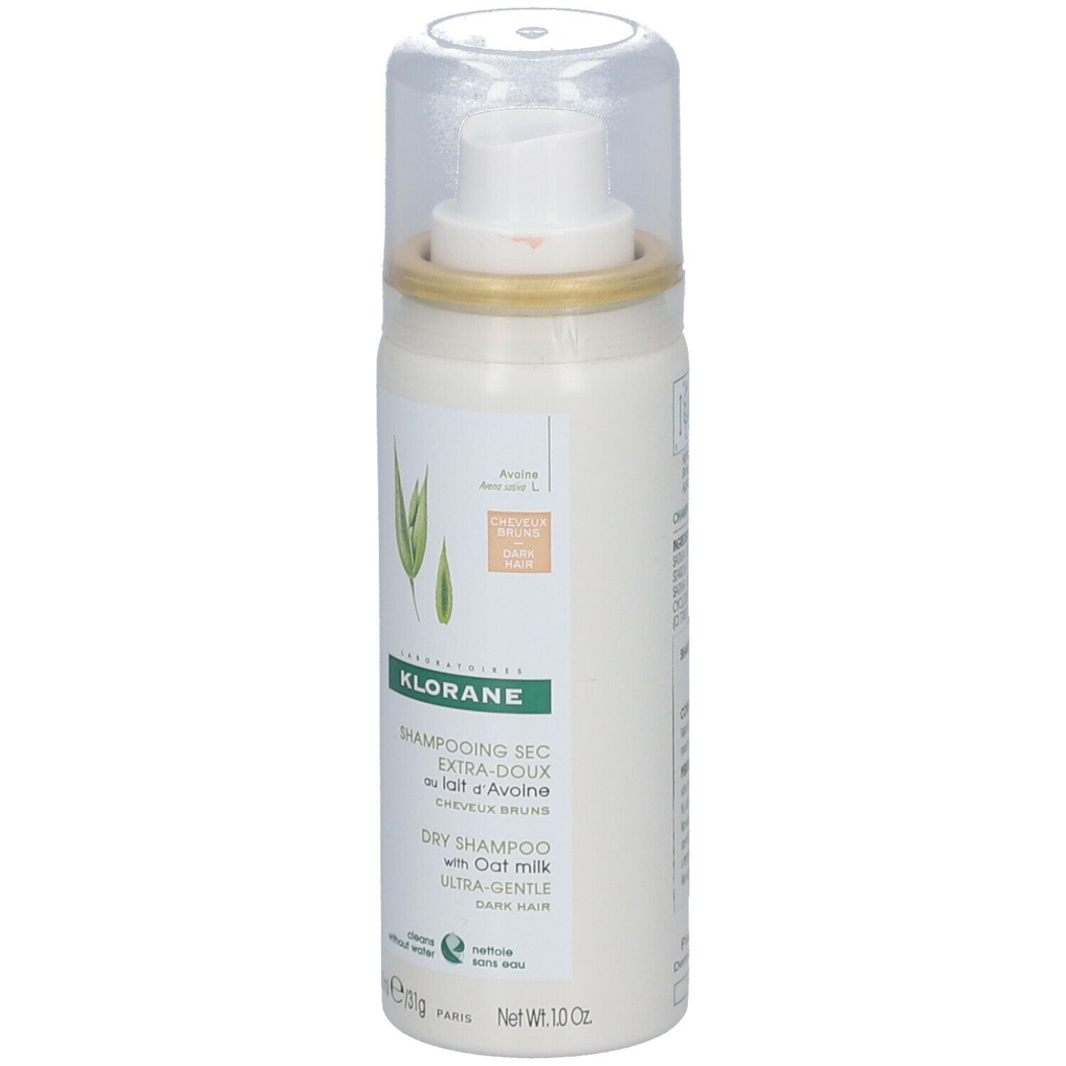Spray blanc avec tête de pulvérisation. Inscription : KLORANE, shampooing sec au lait d'avoine. Avec illustration de plantes.