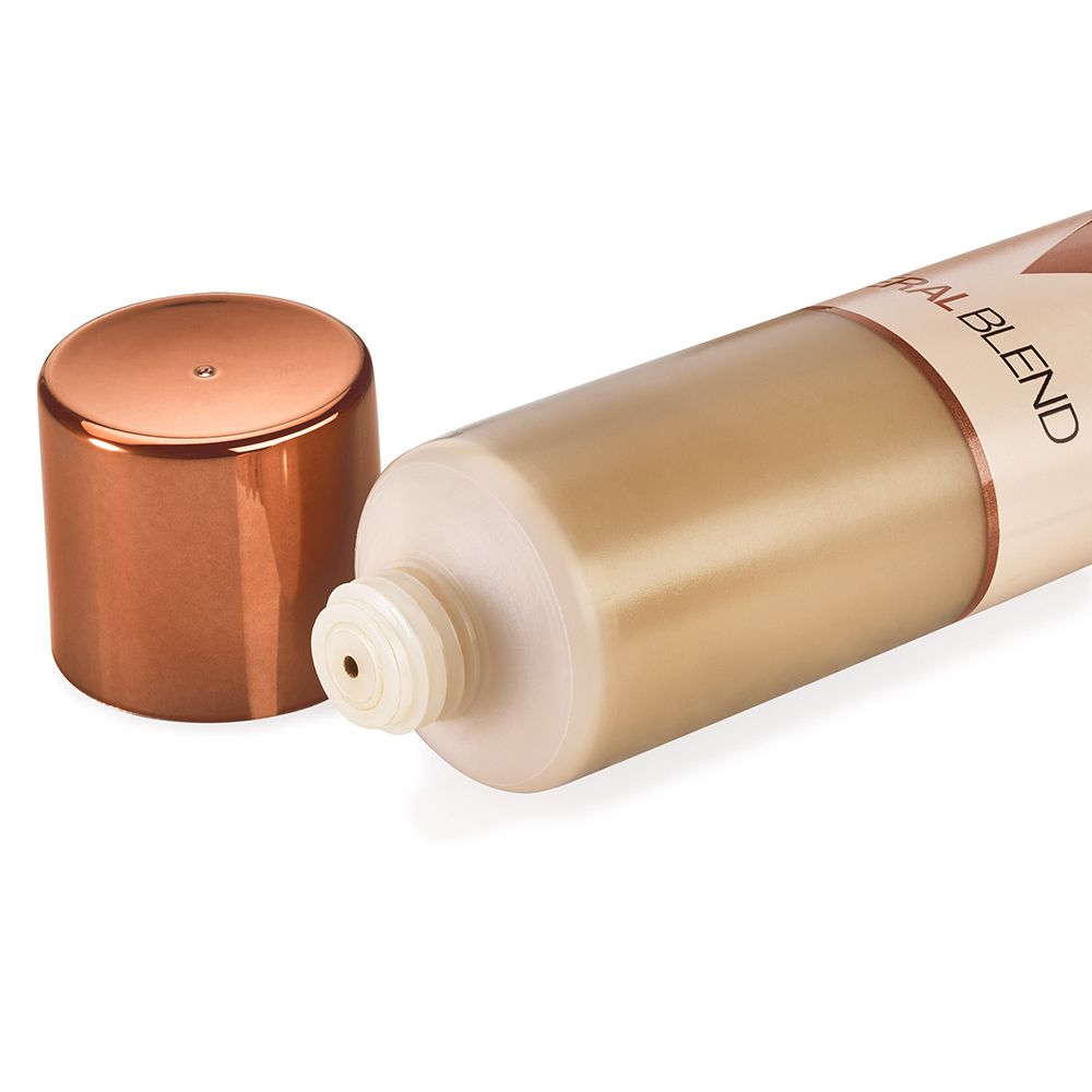Tube Vichy Mineralblend, bouchon à côté. Tube avec fond de teint beige. Aucune indication de produit visible.