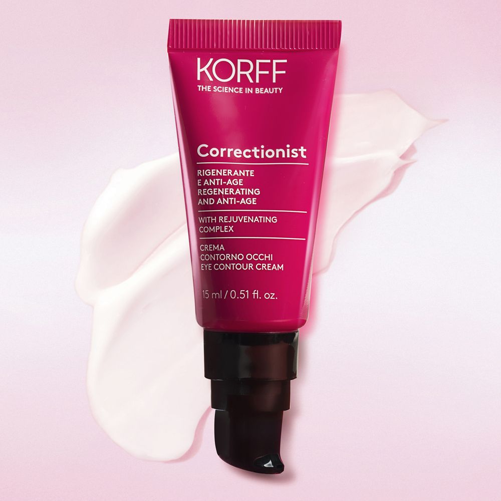 Rote Tube mit schwarzem Deckel. Aufschrift: KORFF, Correctionist Augencreme, 15 ml. Creme-Klecks.