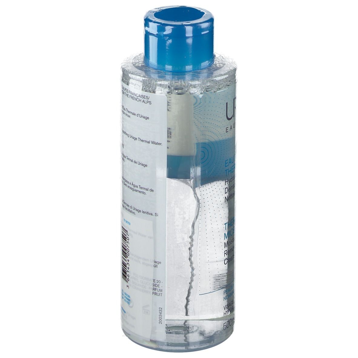 Flacon transparent avec bouchon bleu. Inscription: URIAGE, EAU THERMALE. Informations produit au dos.