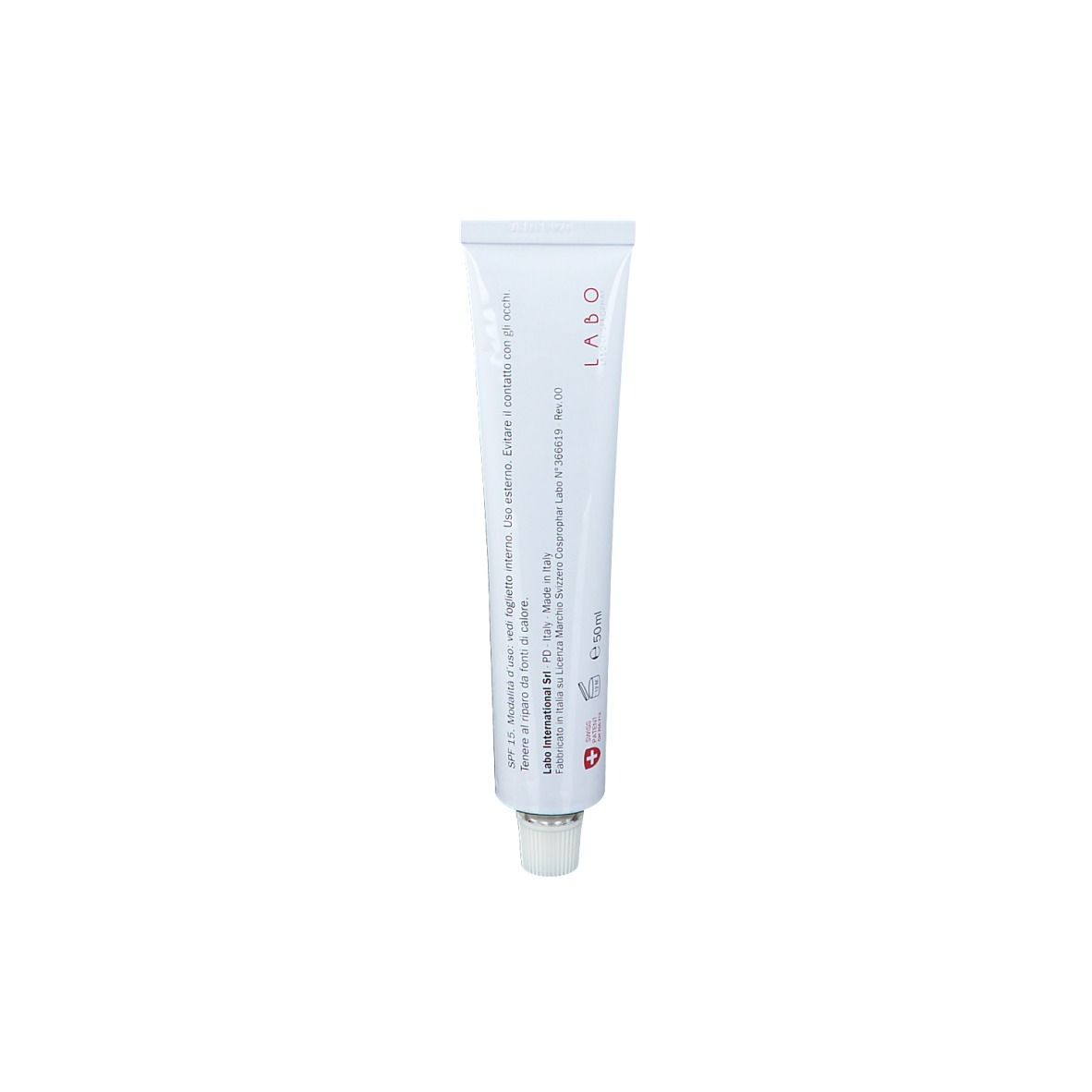 Tube blanc avec inscription LABO. Inscription avec informations sur le produit. Point rouge.