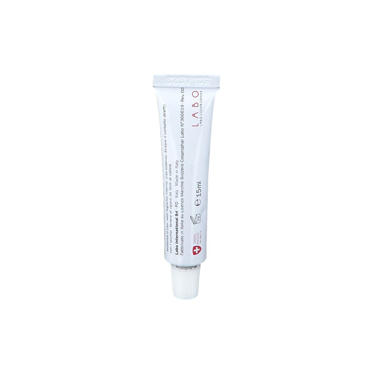 Tube blanc avec bouchon blanc. Inscription : Labo, E 15ml, et une croix rouge. Fabriqué en Italie.