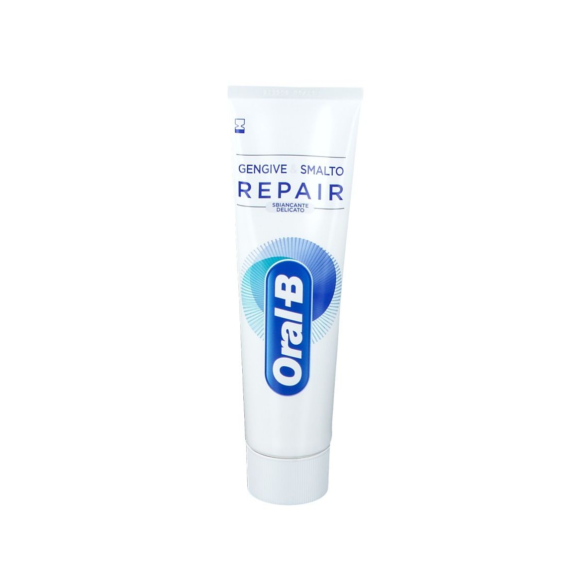 Weiße Zahnpasta-Tube mit blauem Oral-B Logo. Produktname Repair. Aufschrift 'Gengive & Smalto'.