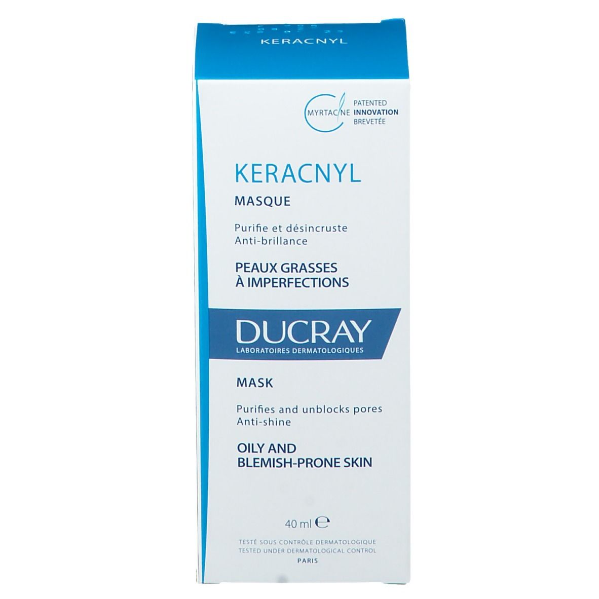 Kartonverpackung mit blauer Aufschrift. Enthält KERACNYL Maske. Text: Purifies and unblocks pores, Anti-shine. 40ml.