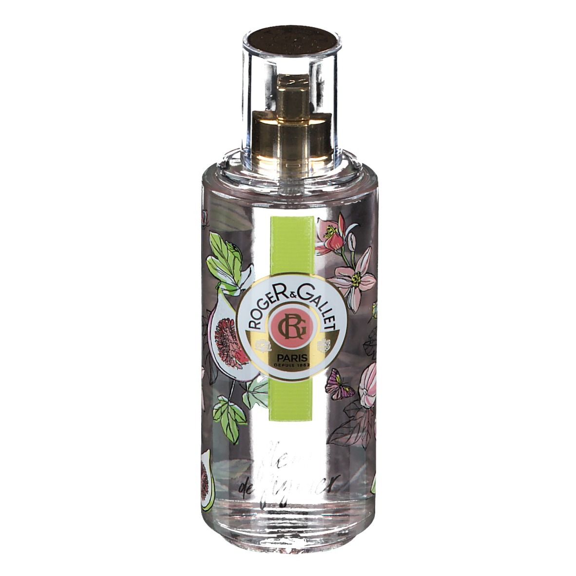 Flacon transparent avec vaporisateur doré. Étiquette avec figues, fleurs et logo. Bande verte et blanche avec logo.