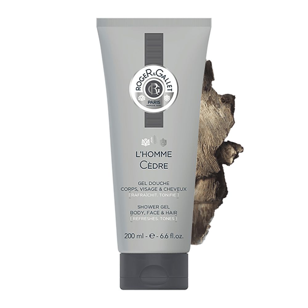 Tube gris avec logo et nom du produit. Morceau de bois à droite. Texte: Gel Douche, L'Homme Cèdre.